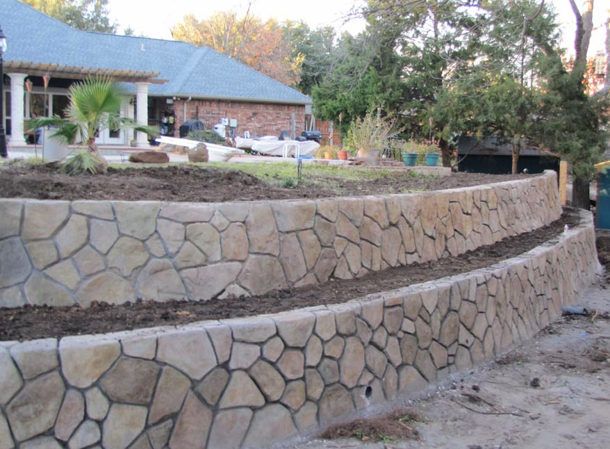This picture is a concrete retaining wall